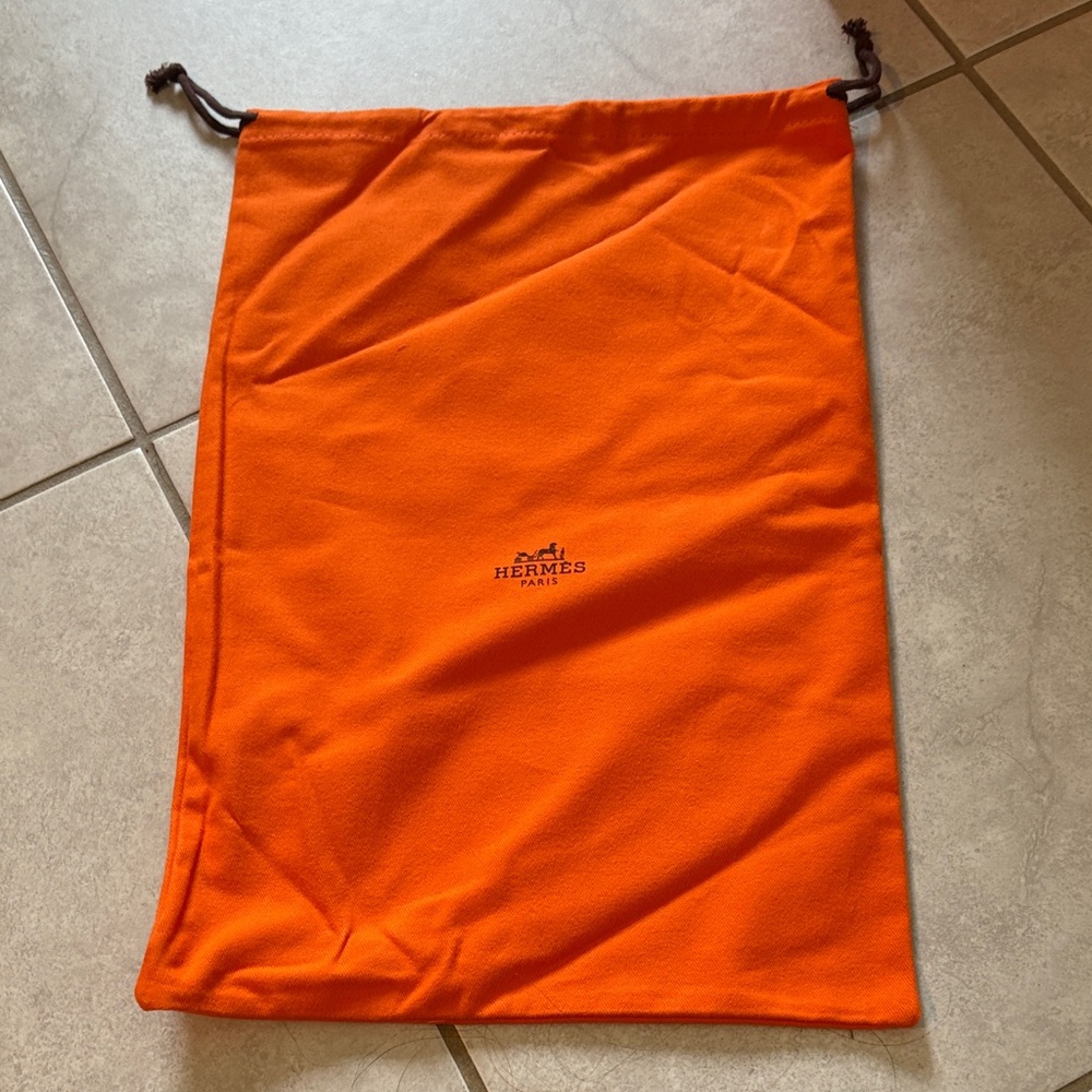 Hermès Vibrant Orange Drawstring Bag